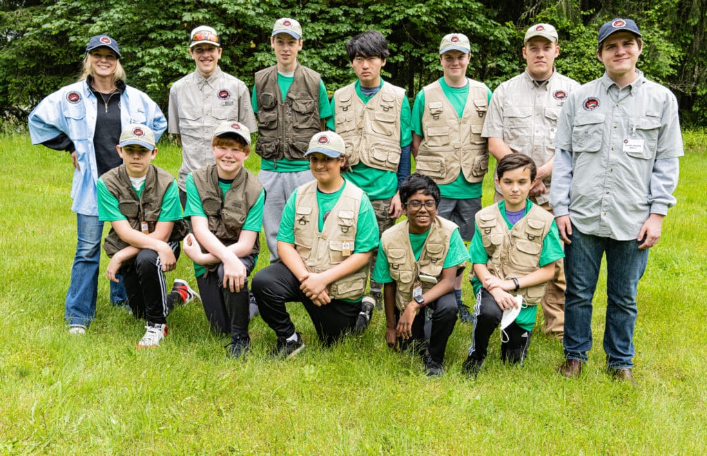 Group photo of fly fishing campers